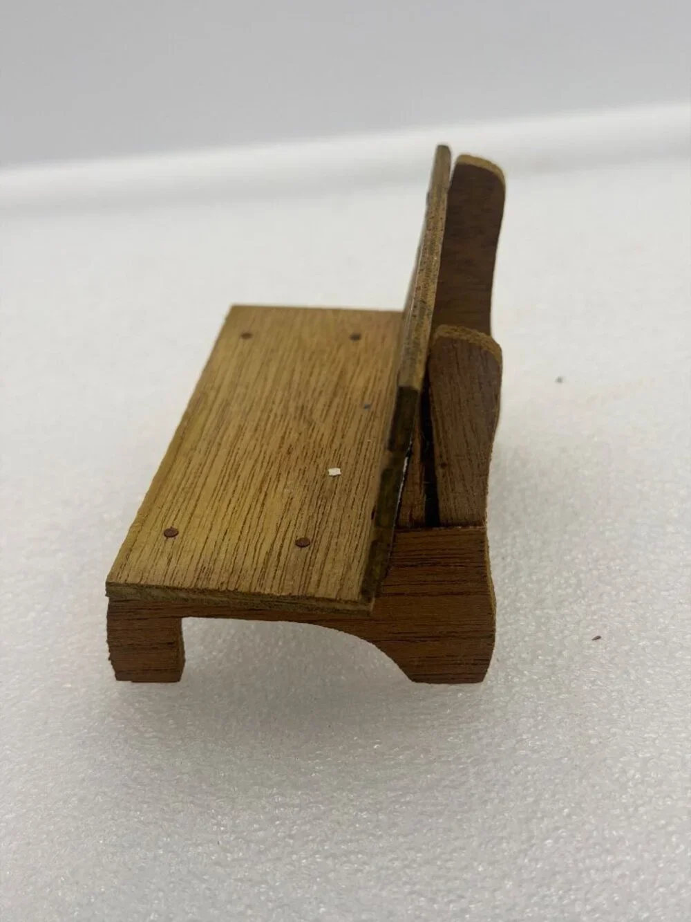 Vintage Cast Iron Amish Couple Salt and Pepper Shakers on Wood Bench
